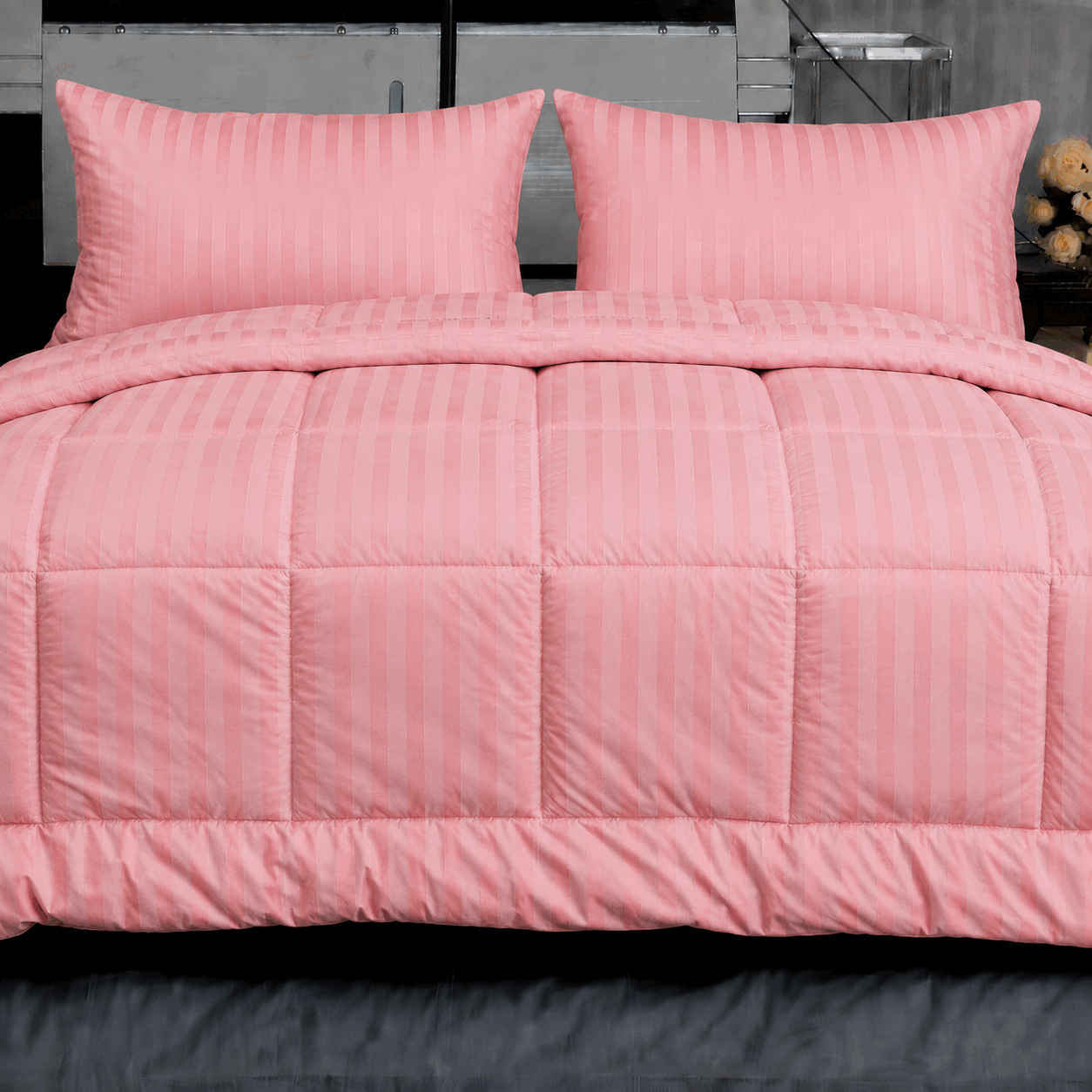 Soft Pink Striped Bedding Display for UAE commercial textile supply